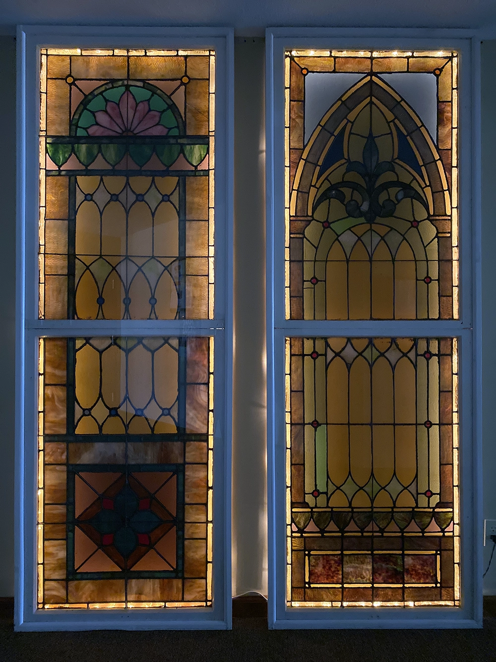 Church windows from the prior building on North York Street in Martinsville are on display in the new church building.